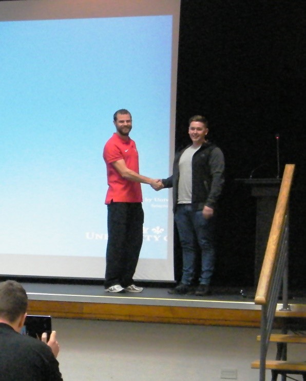 Cemil Yesilyurt recieveing his award at the BASRaT Annual Symposium at the University of Hull.